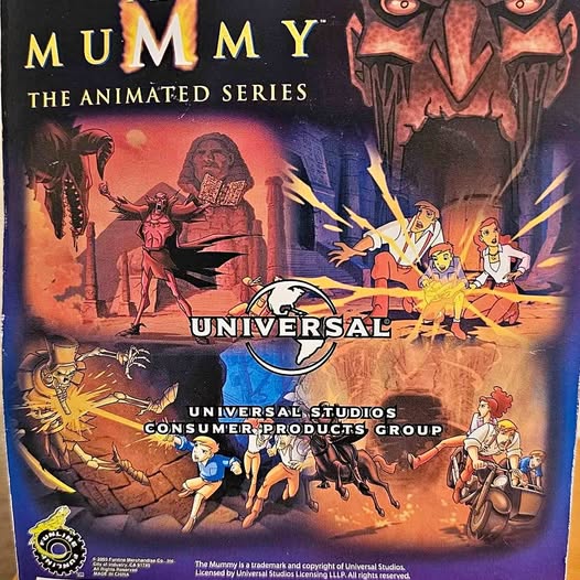 Sealed 1:64 diecast Mummy Animated Series toy in retail box with monster artwork