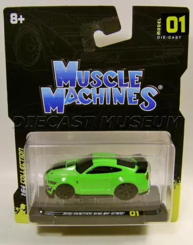 Green die-cast muscle car in clear blister pack, front view