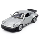 Silver Porsche 911 Turbo diecast model car, two-door coupe with black roof