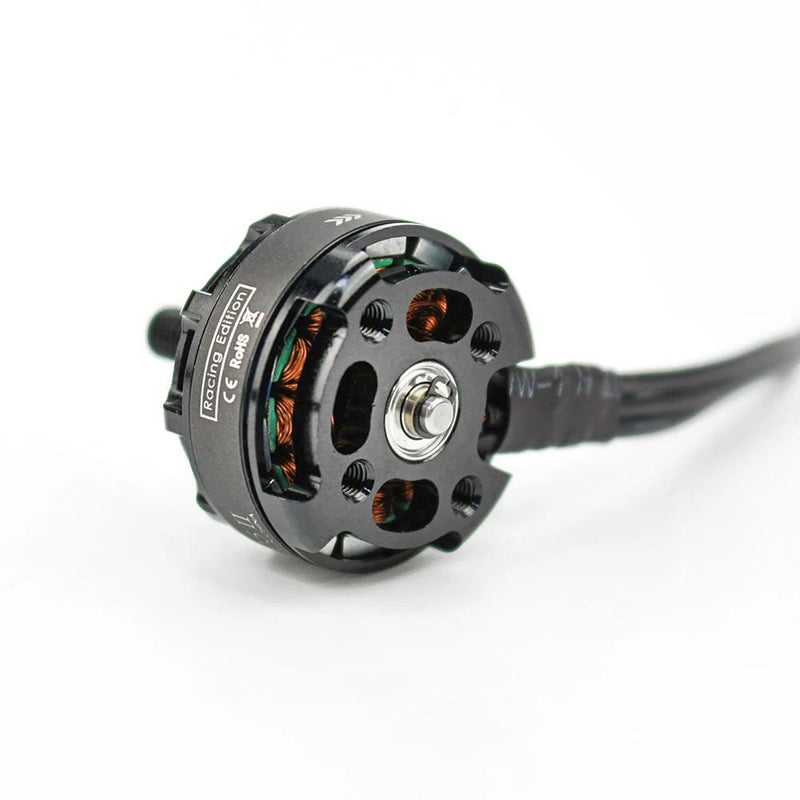 Brushless drone motor with circular housing, copper windings, mounting holes, and lead wire