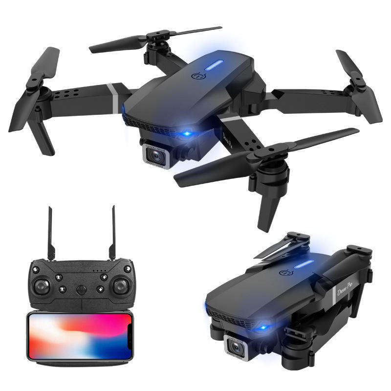 Foldable quadcopter RC drone with dual cameras, dark gray body, blue LEDs, and remote controller