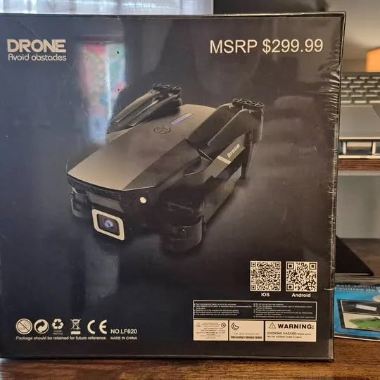 Drone retail package box with MSRP $299.99 and QR code labels