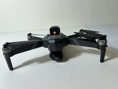 Gray quadcopter drone with front camera gimbal