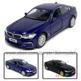 1/36 scale BMW M550i xDrive diecast model car, blue, front 3/4 view