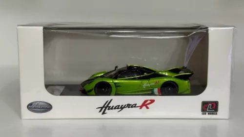 Green Pagani Huayra R diecast model car in display box