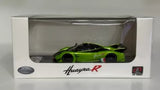 Green Pagani Huayra R diecast model car in display box