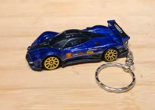 Blue diecast model car keychain with chrome key ring and front grille detail