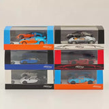1:64 diecast car model set in six boxes, featuring orange, blue, and gray cars