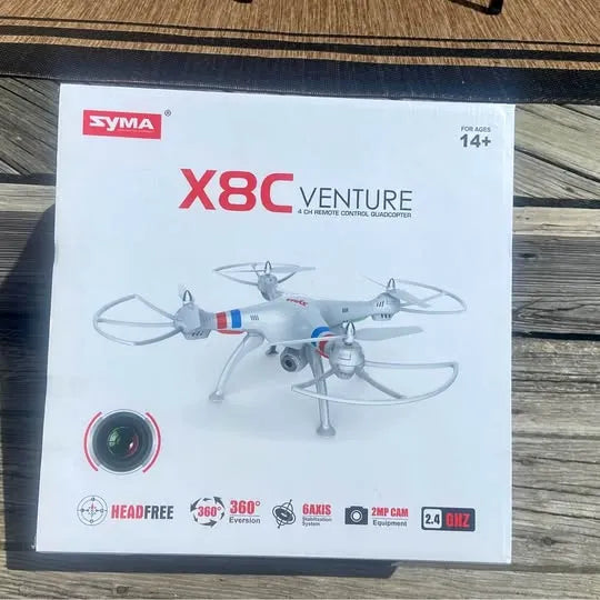 Syma X8C Venture drone in retail box, white and blue quadcopter with camera