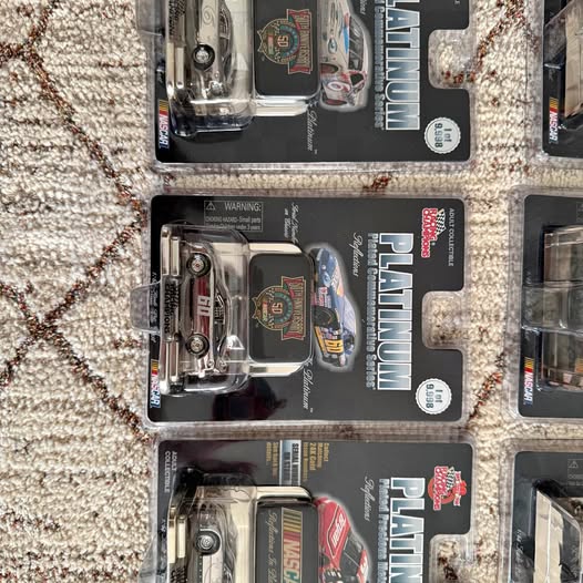 Platinum plated diecast car set in blister packaging, multiple cars visible