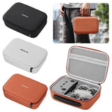 Waterproof drone storage case set with orange and gray zippered compartments