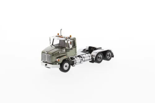 Green diecast tandem tractor model with open cab and chrome trailer hitch