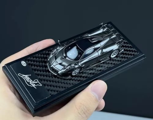 Gray super racing sports diecast model car in display box tray