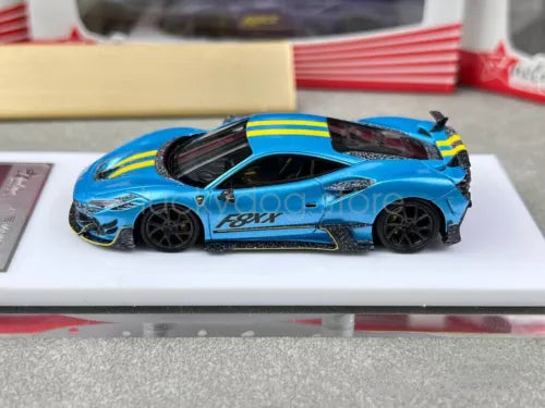 Blue racing sports diecast car model with black wheels and rear spoiler