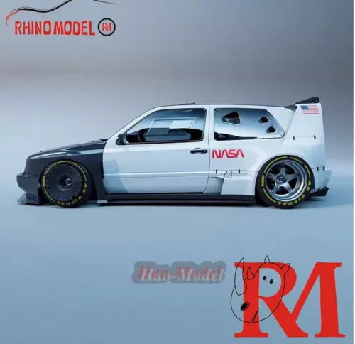 White and black diecast model car with NASA decals, front three-quarter view, alloy wheels