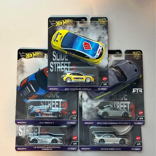 Hot Wheels diecast car multipack with street cars, including a yellow race car