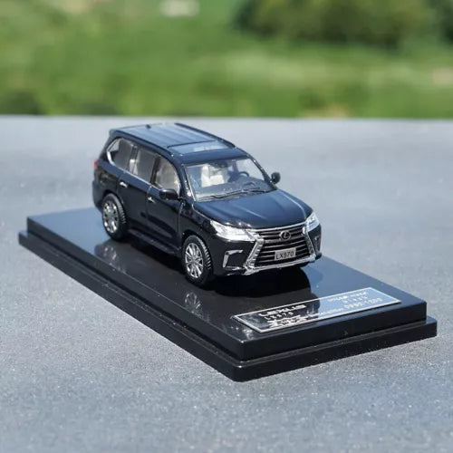 1/64 scale LEXUS LX570 diecast SUV model toy in dark blue on display base