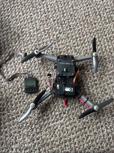 Drone with flight controller, four propellers, and motors installed