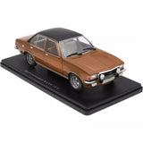 1:24 scale diecast car with brown body and black roof on display base