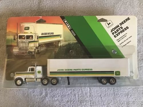 John Deere Parts Express Kenworth tractor trailer diecast truck, green and white