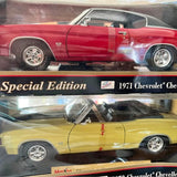 Diecast model car display with red and yellow classic cars in blister packaging