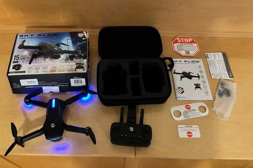 Quadcopter drone starter kit with remote controller and carrying case