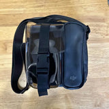 DJI drone case with shoulder strap, zipper closure, dark shell and clear front window