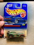 Green Hot Wheels diecast race car in retail blister pack, Panoz GTR-1.