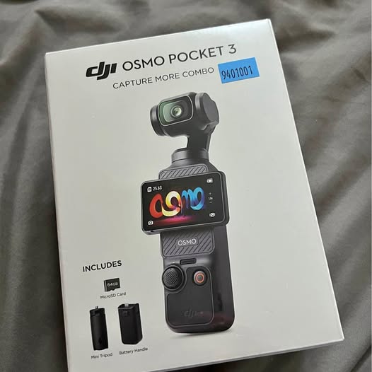DJI Osmo Pocket 3 gimbal drone box with camera handle and display