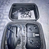 Drone accessory case with remote controller and folded drone inside, open storage compartment