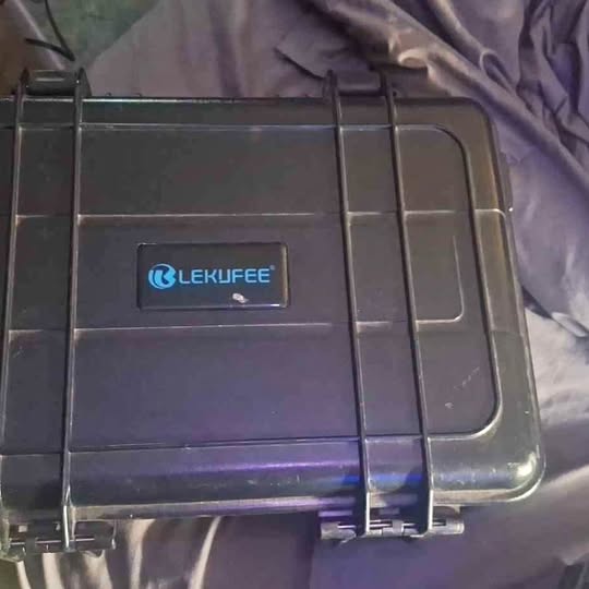 Waterproof hard drone case with front latch and handle, dark gray