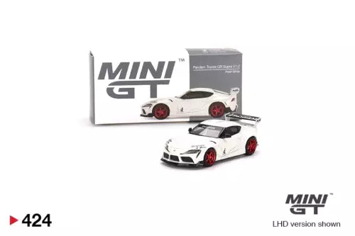 White metal diecast sports car model with red wheels, 1:64 scale, in box