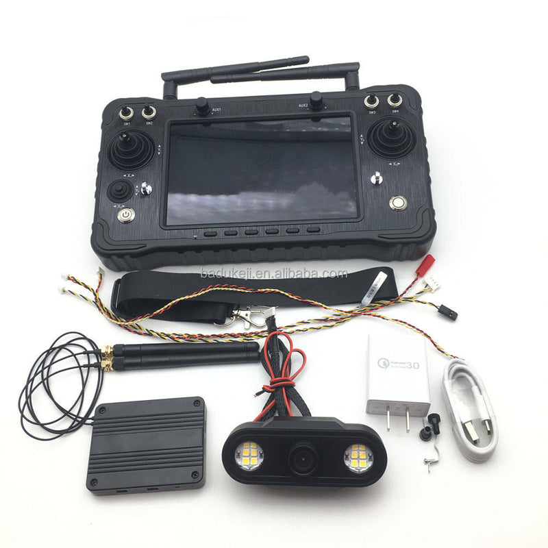 Black remote controller with LCD screen, joysticks, and camera module with LED lights