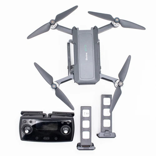 Bwinej F7 4K quadcopter drone kit with gray controller and controller stand