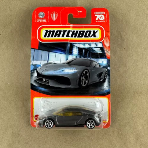 Matchbox 1:64 diecast sports car in gray blister pack, front view
