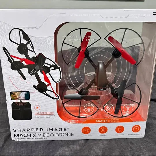 Sharper Image Mach X indoor video drone in retail box, with propellers visible