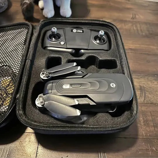 Professional drone in zippered foam case with controller and antennas