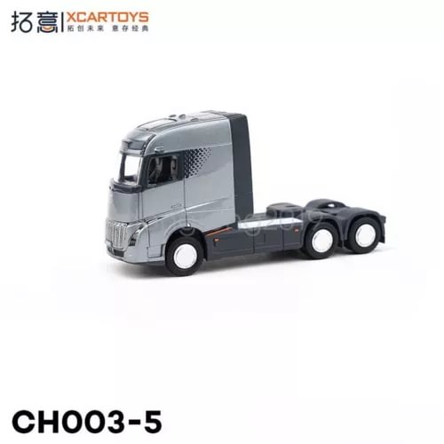 Grey 1/64 truck tractor diecast model with black wheels and front grille