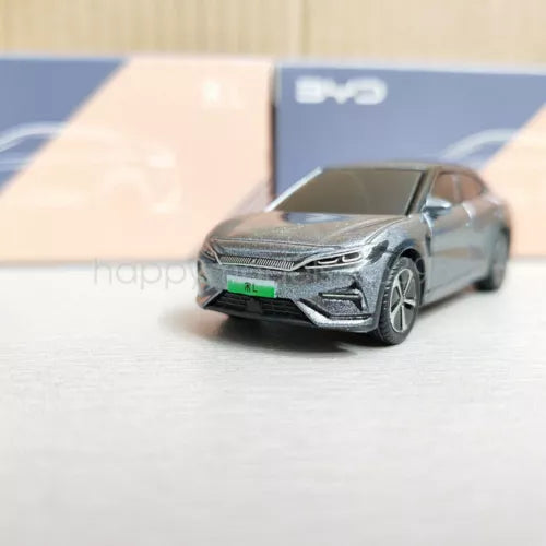 Grey diecast model car toy, front view, detailed grille and headlights