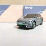 Grey diecast model car toy, front view, detailed grille and headlights