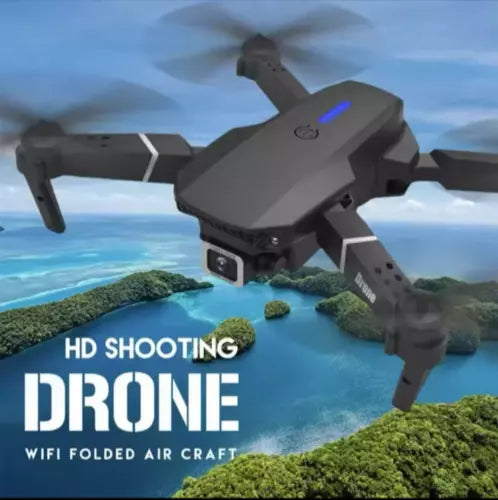 Foldable quadcopter drone with wide-angle camera, dark gray body and propellers