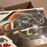 RC quadcopter drone with propellers, orange and gray, in retail box, 2.4GHz