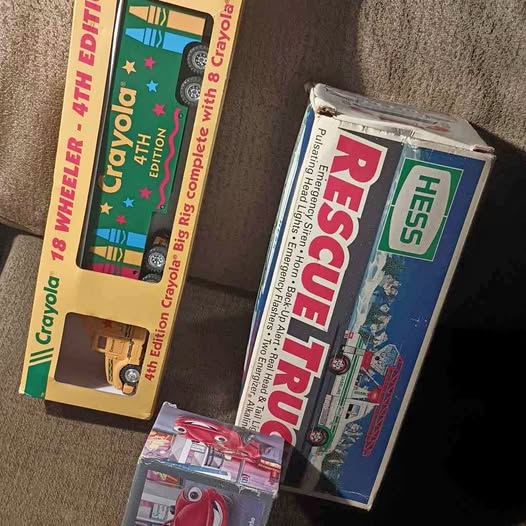 Boxed diecast toy vehicle with Crayola 4th Edition artwork and colorful graphics