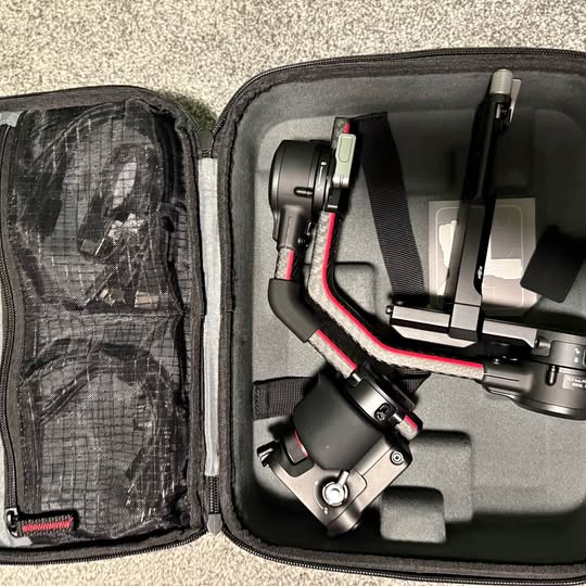 DJI RS 2 Pro gimbal stabilizer in a hard carrying case with accessory pouch