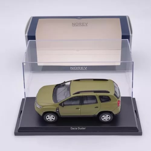 1:43 diecast Dacia Duster model car in green in display case, side view