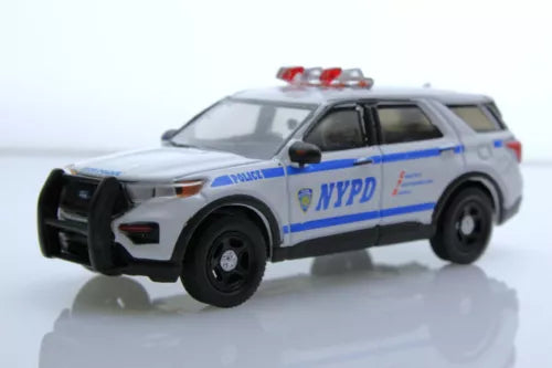 NYPD police car diecast model, white with blue stripe and red roof lights