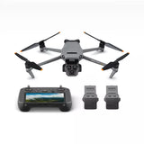 Quadcopter drone with foldable propellers, plus handheld controller with batteries