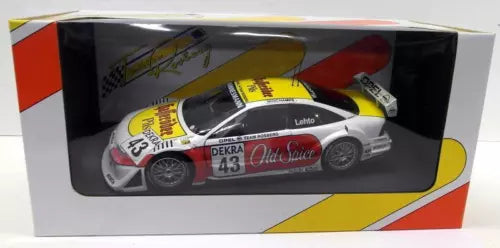 Diecast model car in display box, white race car with number 43