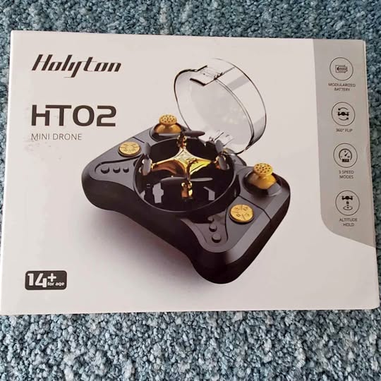 Mini drone retail box with Hulyton HT02 illustration and protective flying guard