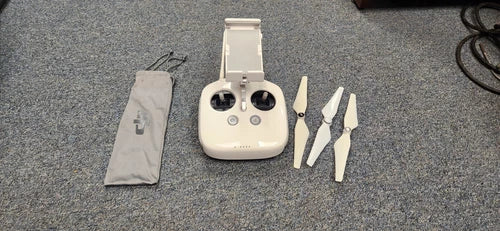 Drone transmitter remote control with phone holder, pouch and three propeller blades